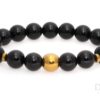 Bracelet “Onyx with a golden ball”
