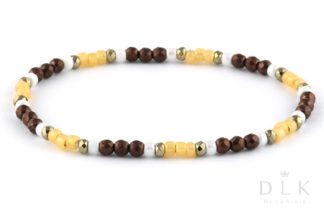 Bracelet “Brown hematites with yellow and white beads”
