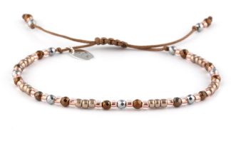 Bracelet “Beige beads with hematite on a string”