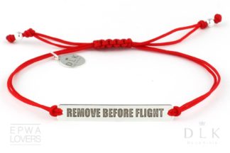 Bracelet “Red string with the words Remove Before Flight”