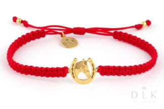 A string bracelet “Red macrame with a golden horseshoe and a horse”