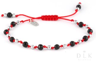 Bracelet “Onyx with silver hematite on a red string”
