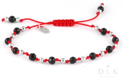 Bracelet “Onyx with silver hematite on a red string”
