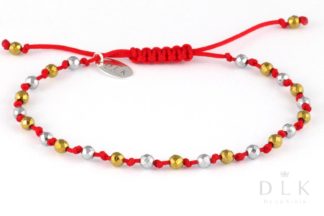 Bracelet “Silver and golden hematites on a red string”