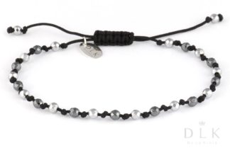 Bracelet “Silver hematites on a black string”