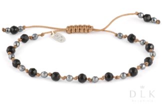 Bracelet “Onyx with hematite on a beige string”
