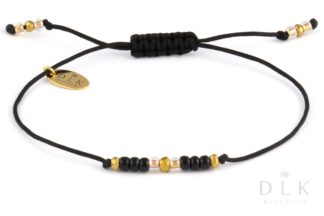 Bracelet “Black beads with golden hematite on a string”
