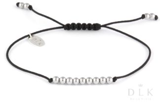 Bracelet “Silver hematite balls on a black string”