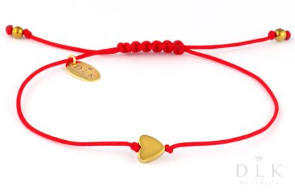 Bracelet “Golden hematite heart on a red string”