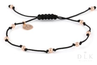 Bracelet “Silver-pink hematite balls on a black string”