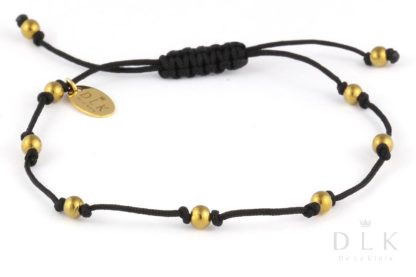 Bracelet “Golden hematite balls on a black string”