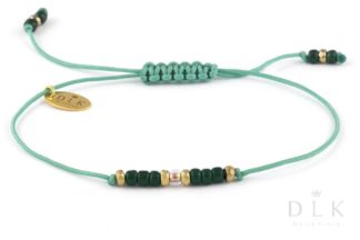 Bracelet “Green beads with golden hematite on an emerald string”
