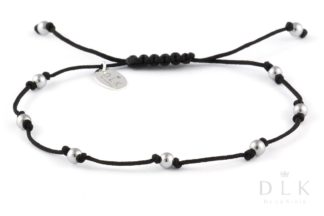 Bracelet “Silver hematite balls on a black string”