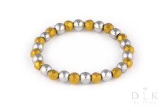 Pierścionek elastyczny ze srebrnych i złotych hematytów