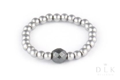 Flexible ring made of silver hematite with a dark faceted hematite ball