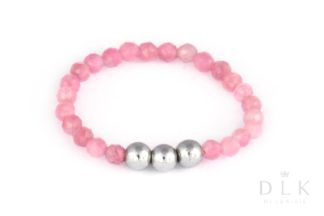 Flexible ring made of pink rubies with three silver hematite balls