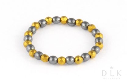 Pierścionek elastyczny z czarnych i złotych hematytów