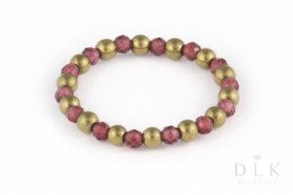 Pierścionek elastyczny z granatów i jasno-złotych hematytów