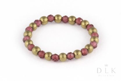 Pierścionek elastyczny z granatów i jasno-złotych hematytów