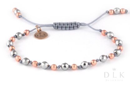 Bracelet “Silver and pink hematites on a gray string”