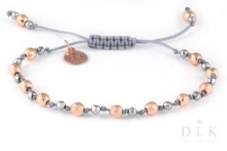 Bracelet “Pink and silver hematites on a gray string”