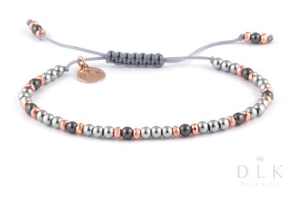 Bracelet “Pink-silver-black hematites on a gray string”