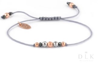 Bracelet “Hematites Rose Gold on a gray string”