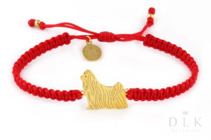 Bracelet with yorkshire terrier golden on a red macrame