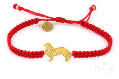 Bracelet with Bernese Mountain Dog golden on a red macrame