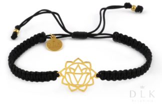 Bracelet with a golden solar plexus chakra on a black macrame