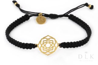 Bracelet with a gold crown chakra on a black macrame