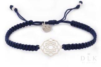 Bracelet with a silver crown chakra on a navy blue macrame