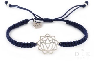 Bracelet with a silver solar plexus chakra on a navy blue macrame