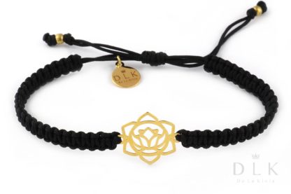 Bracelet with a golden sacral chakra on a black macrame