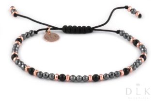 Bracelet with onyx balls with pink and black hematites on a black string