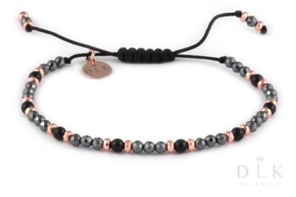 Bracelet with onyx balls with pink and black hematites on a black string