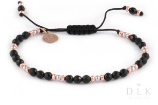 Bracelet with silver and pink hematites with onyx on a black string