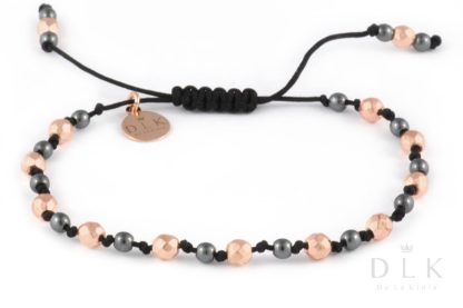 Bracelet “Pink and black hematites on a black string”