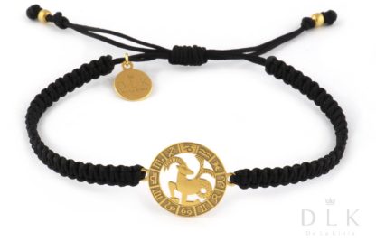 Bracelet with the sign of the zodiac CAPRICORN gold on a black macrame
