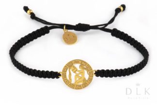 Bracelet with the sign of the zodiac AQUARIUS gold on a black macrame