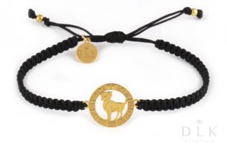 Bracelet with the sign of the zodiac ARIES gold on a black macrame