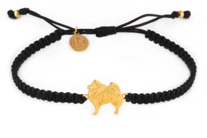 Bracelet with spitz golden on a black macrame