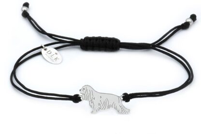 Bracelet with cavalier silver on a black string