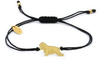 Bracelet with cavalier golden on a black string