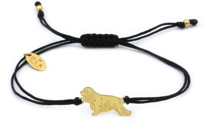 Bracelet with cavalier golden on a black string